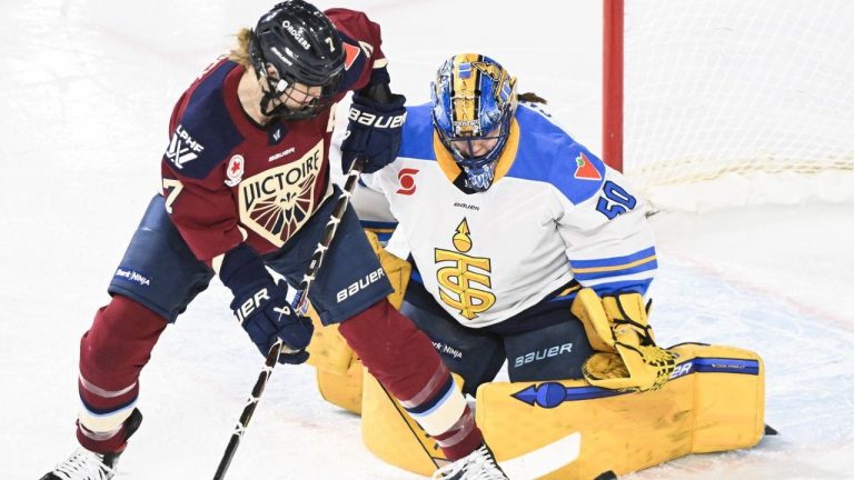 Montreal Victoire's Laura Stacey moves in on Toronto Sceptres goaltender Kristen Campbell during second period PWHL action in Laval, Que. Sunday, March 23, 2025. (THE CANADIAN PRESS/Graham Hughes)