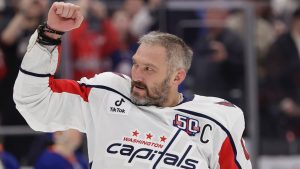 Washington Capitals left wing Alex Ovechkin (8) celebrates after scoring his 895th career goal during the second period of an NHL hockey game against New York Islanders in Elmont, N.Y., Sunday, April 6, 2025. (Adam Hunger/AP)