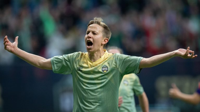 Vancouver Rise's Quinn celebrates their goal against the Calgary Wild during the first half of an NSL match in Vancouver on Wednesday, April 16, 2025. (THE CANADIAN PRESS/Ethan Cairns)