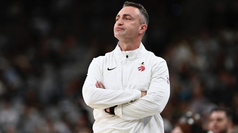 Toronto Raptors head coach Darko Rajakovic watches play during the first half of an NBA basketball game against the San Antonio Spurs, Sunday, April 13, 2025, in San Antonio. (Darren Abate/AP)