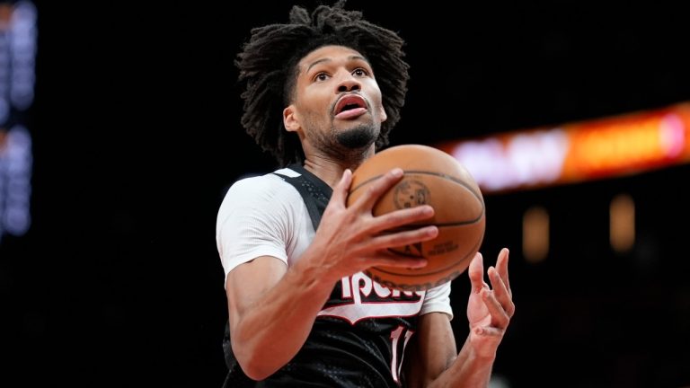 Portland Trail Blazers guard Shaedon Sharpe (17) shoots against the Atlanta Hawks during the second half of an NBA basketball game, Tuesday, April 1, 2025, in Atlanta. (AP Photo/Mike Stewart)