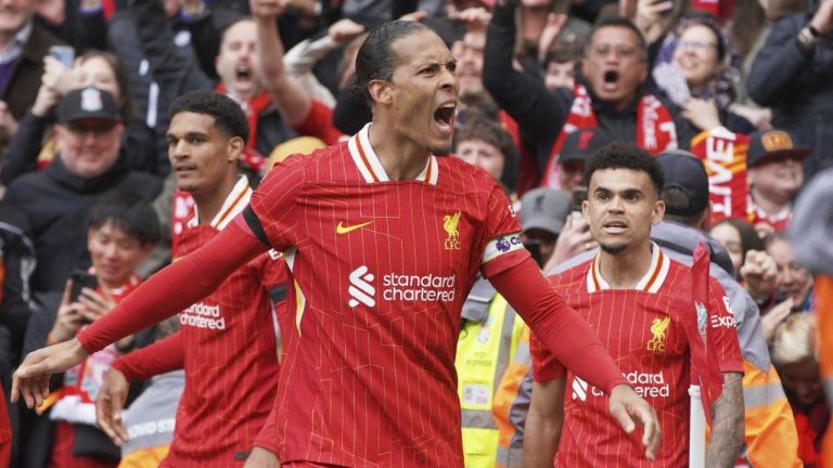 Liverpool's Virgil van Dijk celebrates after scoring his side's second goal during the English Premier League match between Liverpool and West Ham United at Anfield in Liverpool, Sunday, April 13, 2025. (AP/Ian Hodgson)