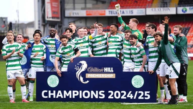 Celtic players celebrate victory in the William Hill Premiership following the William Hill Premiership match between Dundee United and Celtic at Tannadice Park, Dundee, Scotland, Saturday, April 26, 2025. (Andrew Milligan/PA via AP)