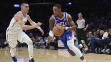 Robinson scores 21, Herro adds 20 and Heat rally late to beat 76ers