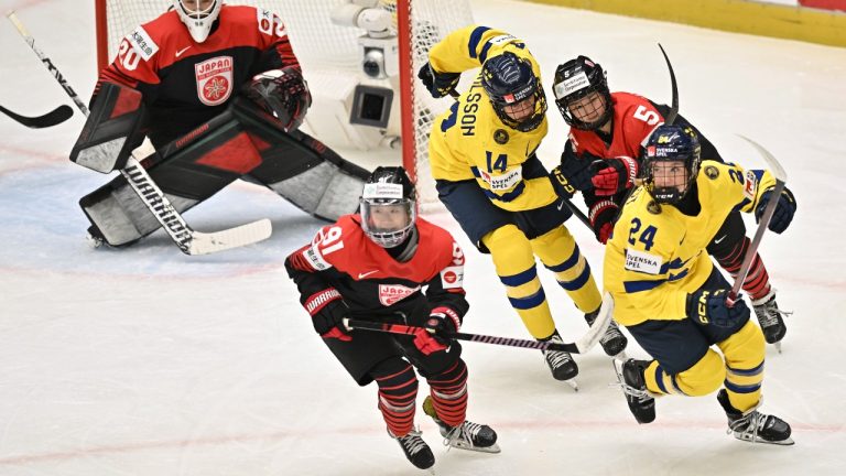 From left, goalkeeper Miyuu Masuhara of Japan, Umeka Odaira of Japan, Ida Karlsson of Sweden, Shiori Yamashita of Japan and Ebba Hedqvist of Sweden in action during the IIHF Women's World Championship, Group B, match between Japan and Sweden, in Ceske Budejovice, Czech Republic, Sunday, April 13, 2025. (Luboš Pavlíček/CTK via AP)