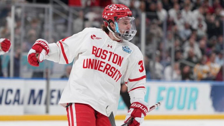 Boston University's Cole Eiserman (34) celebrates after scoring during the second period in a semifinal game in the NCAA Frozen Four men's college hockey tournament against Penn State, Thursday, April 10, 2025, in St. Louis (Jeff Roberson/AP Photo)