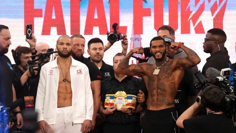 Chris Eubank Jr., left, and Conor Benn face off during the weigh in at the Business Design Centre, London, Friday April 25, 2025. (Bradley Collyer/PA via AP)