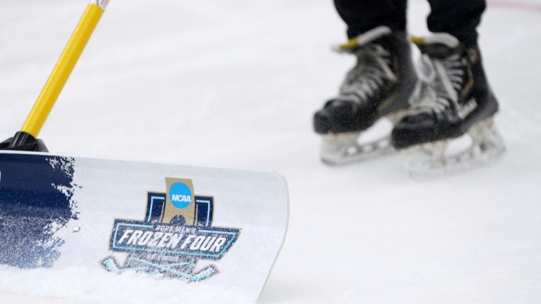 The ice is cleared during a timeout in the first period in a semifinal game in the NCAA Frozen Four men's college hockey tournament between Boston University and Penn State, Thursday, April 10, 2025, in St. Louis (Jeff Roberson/AP Photo)