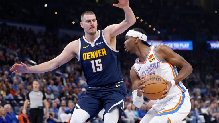 Oklahoma City Thunder guard Shai Gilgeous-Alexander, right, drives against Denver Nuggets centre Nikola Jokic (15) during the first half of an NBA basketball game Monday, March 10, 2025, in Oklahoma City. (Nate Billings/AP)
