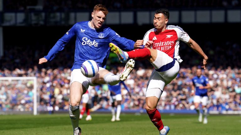 Everton's Jake O'Brien, left, and Arsenal's Gabriel Martinelli battle for the ball during the English Premier League soccer match between Everton and Arsenal at Goodison Park, Liverpool, England, Saturday, April 5, 2025. (Martin Rickett/PA via AP)