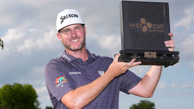Taylor Pendrith poses with the champion's trophy after winning the Byron Nelson golf tournament. (LM Otero/AP)