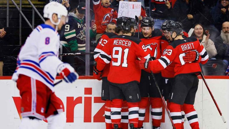 New Jersey Devils right wing Timo Meier (28) celebrates with teammates after scoring a goal against the New York Rangers during the second period of an NHL hockey game. (Noah K. Murray/AP)