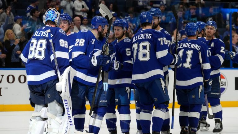 Tampa Bay Lightning goaltender Andrei Vasilevskiy (88) celebrates with his teammates after an NHL hockey game against the Calgary Flames Thursday, Feb. 27, 2025, in Tampa, Fla. (Chris O'Meara/AP)