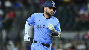 Toronto Blue Jays' Bo Bichette runs the bases after scoring a home run against the Texas Rangers during the ninth inning of a baseball game Wednesday, May 28, 2025, in Arlington, Texas. (Ronaldo Bolaños/AP)
