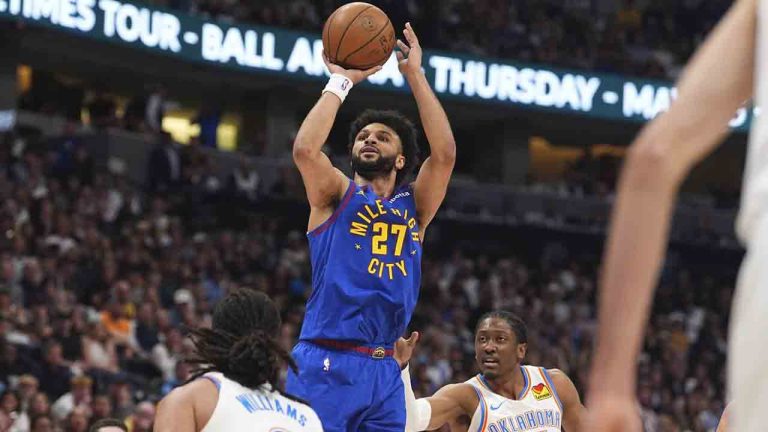 Denver Nuggets guard Jamal Murray (27) goes up for a basket between Oklahoma City Thunder forwards Jaylin Williams (6) and Jalen Williams (8) in the first half of Game 3 in the Western Conference semifinals of the NBA basketball playoffs Friday, May 9, 2025, in Denver. (David Zalubowski/AP)