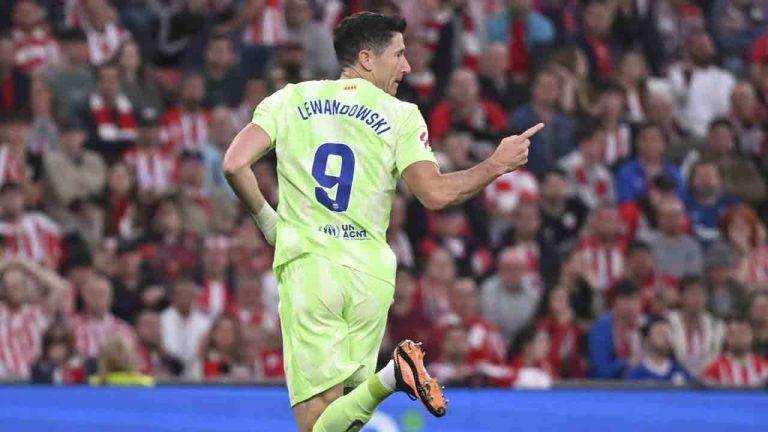 Barcelona's Robert Lewandowski celebrates scoring his side's opening goal during the Spanish La Liga soccer match between Athletic Bilbao and Barcelona at the San Mames stadium in Bilbao, Spain, Sunday, May 25, 2025. (Miguel Oses/AP)