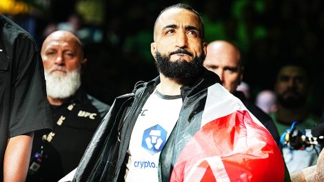 Belal-Muhammad-walks-to-the-Octagon-carrying-the-flag-of-Palestine-ahead-of-a-UFC-welterweight-championship-bout