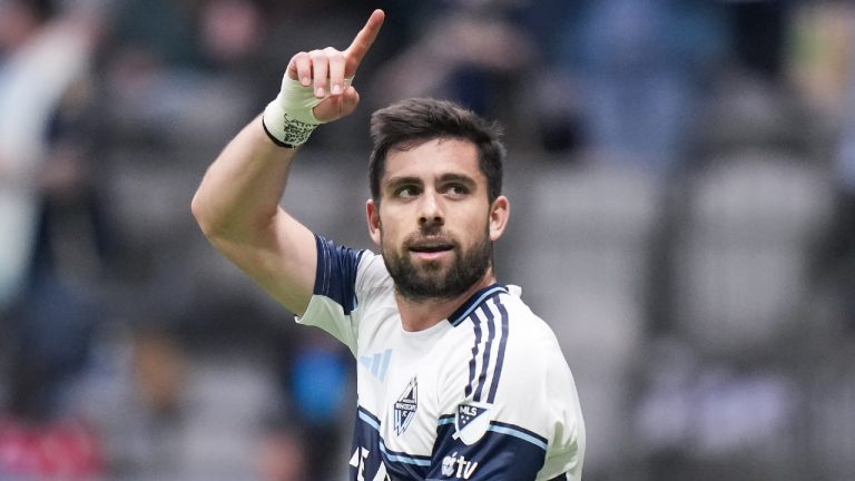 Vancouver Whitecaps' Brian White celebrates his second goal against Los Angeles FC during the second half of an MLS soccer match, in Vancouver, on Sunday, May 11, 2025. (Darryl Dyck/CP)
