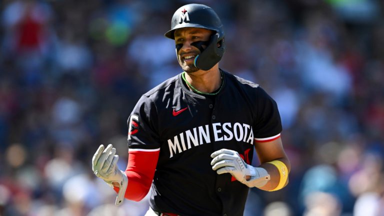 Minnesota Twins' Royce Lewis celebrates drawing a walk during the fourth inning of a game against the Cleveland Guardians, Thursday, Sept. 19, 2024, in Cleveland. (Nick Cammett/AP)