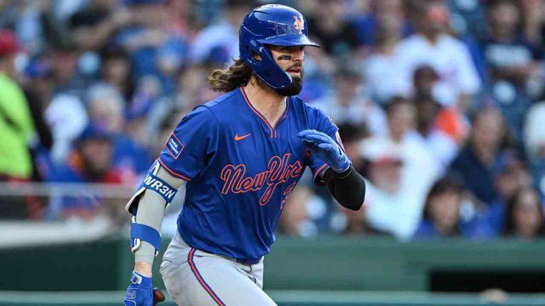 New York Mets' Jesse Winker follows through on his swing after hitting a single against Washington Nationals pitcher Eduardo Salazar during the eighth inning of a baseball game in Washington, Monday, April 28, 2025. (Terrance Williams/AP)