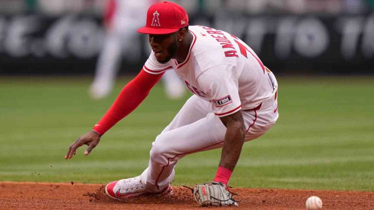 Los Angeles Angels second baseman Tim Anderson can't handle a ball hit for a single by Detroit Tigers' Trey Sweeney during the fourth inning of a baseball game Sunday, May 4, 2025, in Anaheim, Calif. (Mark J. Terrill/AP)
