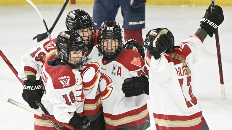 Ottawa Charge's Brianne Jenner (19) celebrates with teammates after scoring against the Montreal Victoire during third period PWHL playoff hockey action in Laval, Que. Sunday, May 11, 2025. THE CANADIAN PRESS/Graham Hughes