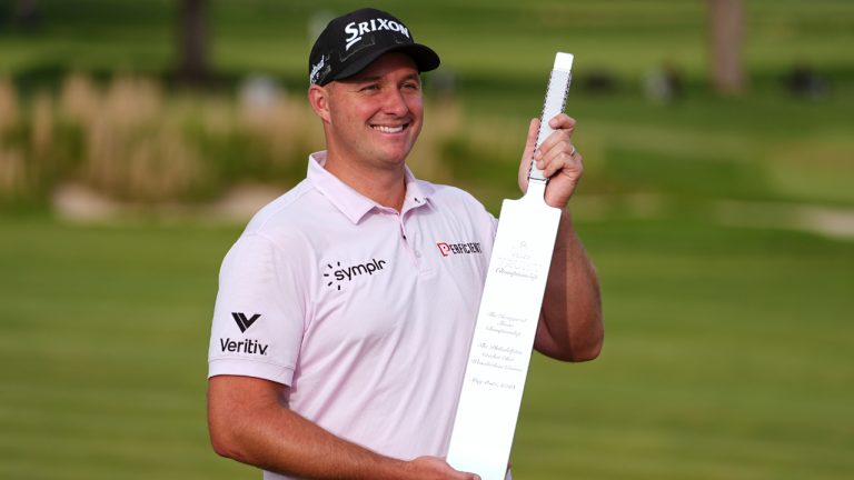 Sepp Straka, of Austria, poses with the trophy after winning the Truist Championship tournament at the Philadelphia Cricket Club, Sunday, May 11, 2025, in Flourtown. (Matt Rourke/AP)