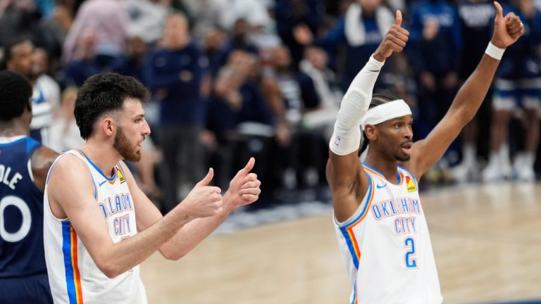 Oklahoma City Thunder forward Chet Holmgren and guard Shai Gilgeous-Alexander gesture during the first half of Game 4 of the Western Conference finals of the NBA playoffs against the Minnesota Timberwolves Monday, May 26, 2025. (Abbie Parr/AP)