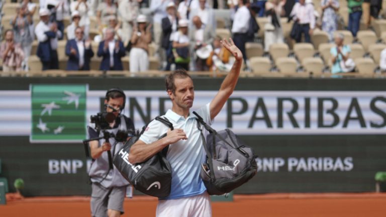 France's Richard Gasquet waves to fans after playing his last match, following his second round match of the French Tennis Open against Italy's Jannik Sinner, at the Roland-Garros stadium, in Paris, Thursday, May 29, 2025. (AP Photo/Thibault Camus)