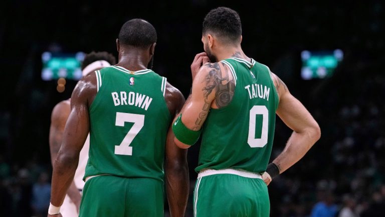 Boston Celtics forward Jayson Tatum (0) and guard Jaylen Brown (7) talk during the second half of Game 2 of an NBA basketball second-round playoff series against the New York Knicks, Wednesday, May 7, 2025, in Boston. (Charles Krupa/AP)