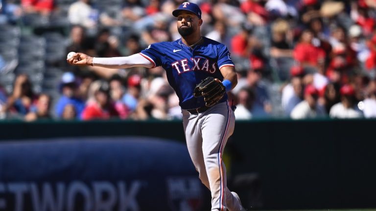 Texas Rangers' Ezequiel Duran throws to first base during the ninth inning against the Los Angeles Angels Sunday, Sept. 29, 2024, in Anaheim, Calif. (AP/John McCoy)