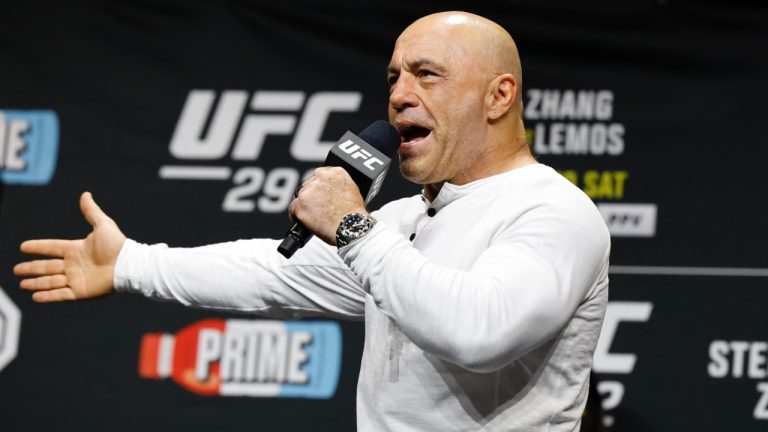 Joe Rogan seen at a UFC ceremonial weigh-in. (Gregory Payan/AP)