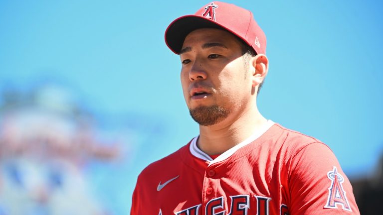 Los Angeles Angels pitcher Yusei Kikuchi returns to the dugout after being relieved during the third inning of a baseball game, Saturday, April 26, 2025, in Minneapolis. (Craig Lassig/AP)