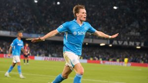 Napoli's Scott McTominay celebrates after scoring the opening goal during the Italian Serie A soccer match between Napoli and Cagliari at the Diego Maradona stadium in Naples, Italy, Friday, May 23, 2025. (Gregorio Borgia/AP)