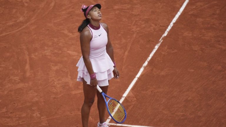 Japan's Naomi Osaka reacts as she plays Spain's Paula Badosa during their first round match of the French Tennis Open, at the Roland-Garros stadium, in Paris, Monday, May 26, 2025. (Christophe Ena/AP)