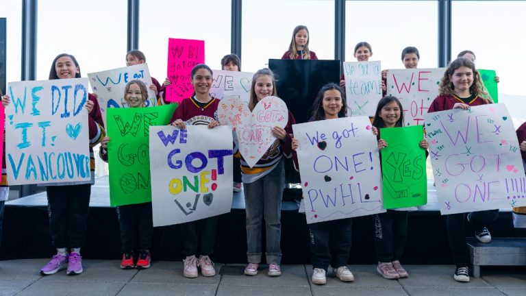 Member of the Vancouver Angels girls ice hockey team help announce that the PWHL will be expanding to Vancouver during a press event in Vancouver, on Wednesday April 23, 2025. The new team will begin play in the 2025-26 season. (Rich Lam/CP)