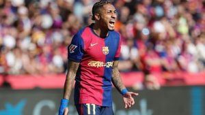 Barcelona's Raphinha reacts during the La Liga match between Barcelona and Real Madrid in Barcelona, Spain, Sunday, May 11, 2025. AP/Joan Monfort)