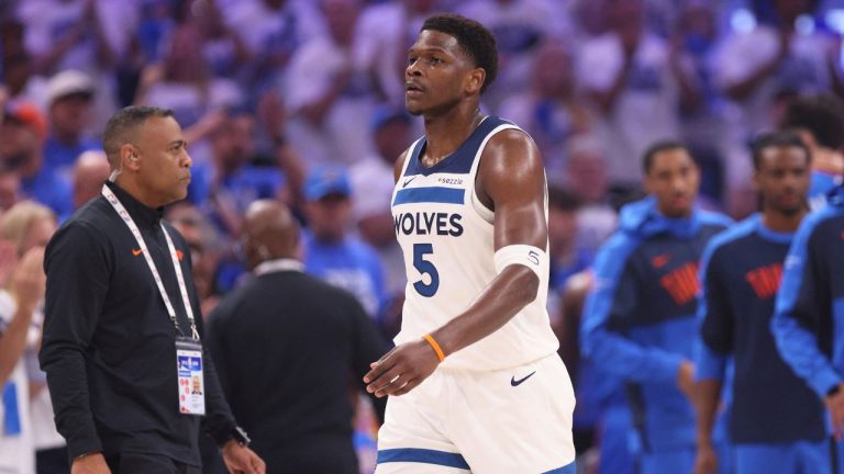 Minnesota Timberwolves guard Anthony Edwards (5) walks across the court during the first half of Game 5 of the Western Conference finals of the NBA basketball playoffs against the Oklahoma City Thunder, Wednesday, May 28, 2025, in Oklahoma City. (Nate Billings/AP)
