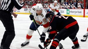 Florida Panthers' Sam Bennett (9) faces off against Carolina Hurricanes' Sebastian Aho (20) during the first period of Game 2 of the NHL hockey Stanley Cup Eastern Conference finals in Raleigh, N.C., Thursday, May 22, 2025. (Karl DeBlaker/AP)