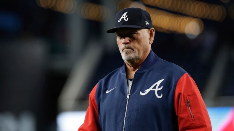 Atlanta Braves manager Brian Snitker walks off the field after removing pitcher Aaron Bummer from the game for pitcher Enyel De Los Santos during the fifth inning of a baseball game against the Washington Nationals in Washington, Thursday, May 22, 2025. (Terrance Williams/AP)
