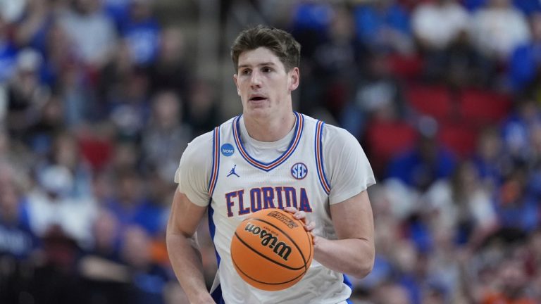 Florida forward Alex Condon brings the ball down court against UConn during the second half in the second round of the NCAA college basketball tournament, Sunday, March 23, 2025, in Raleigh, N.C. (Chris Carlson/AP)