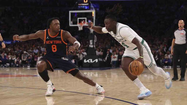 Boston Celtics' Jrue Holiday, right, drives to the basket against New York Knicks' OG Anunoby, left, during the second half of an NBA basketball game, Tuesday, April 8, 2025, in New York. (Pamela Smith/AP)