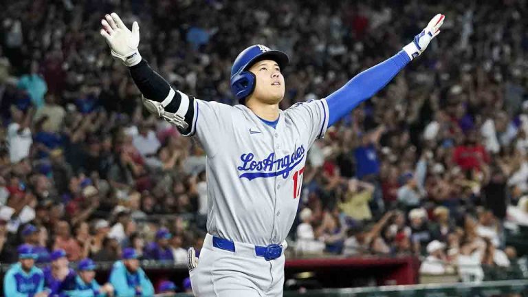 Los Angeles Dodgers' Shohei Ohtani celebrates a three run home run against for the Arizona Diamondbacks during the ninth inning of a baseball game Friday, May 9, 2025, in Phoenix. (Darryl Webb/AP)