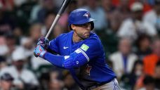 Blue Jays’ Springer exits vs. Yankees after collision on slide at third base