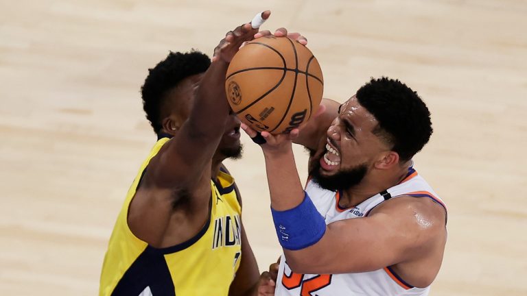 New York Knicks centre Karl-Anthony Towns (32) puts up a shot against Indiana Pacers centre Thomas Bryant (3) during the third quarter of Game 5 of the NBA basketball Eastern Conference finals, Thursday, May 29, 2025, in New York. (Adam Hunger/AP Photo)