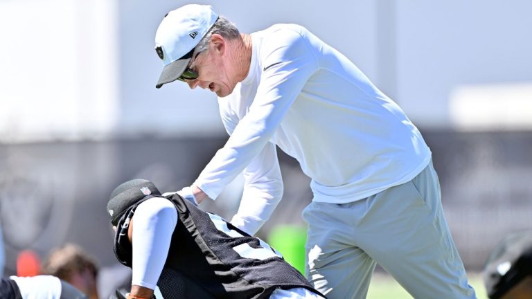 Las Vegas Raiders head coach Pete Carroll works with players during NFL football practice at the team's training facility, Wednesday, May 21, 2025, in Henderson, Nev. (David Becker/AP)