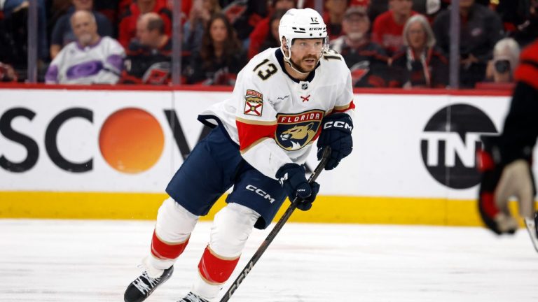 Florida Panthers' Sam Reinhart (13) controls the puck against the Carolina Hurricanes during the first period of Game 1 of the NHL hockey Stanley Cup Eastern Conference finals in Raleigh, N.C., Tuesday, May 20, 2025. (Karl DeBlaker/AP)