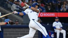 Blue Jays&#8217; Santander has rehab stint delayed due to back tightness