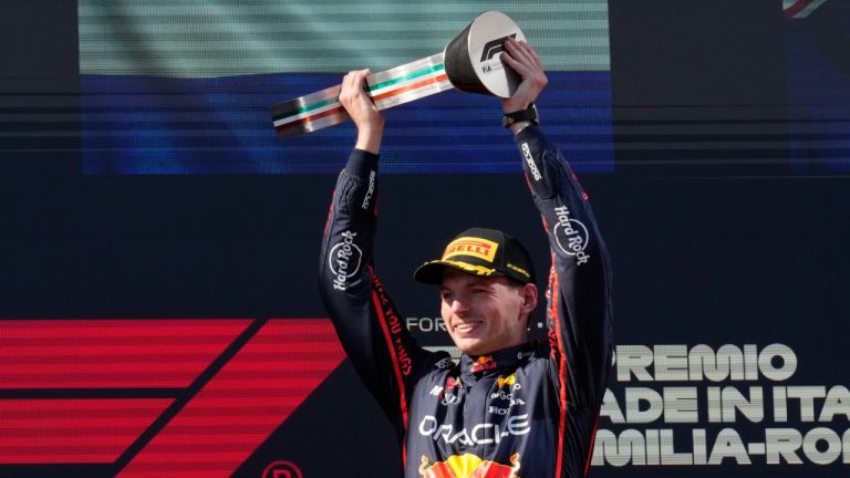 Red Bull driver Max Verstappen of the Netherlands celebrates on the podium after winning the Italian Emilia Romagna Formula One Grand Prix, at the Enzo and Dino Ferrari racetrack in Imola, Italy, Sunday, May 18, 2025. (Luca Bruno/AP)