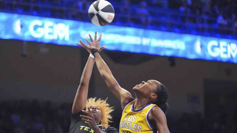 Dallas Wings forward NaLyssa Smith (1) shoots against Los Angeles Sparks forward Azura Stevens (23) during the first half of a WNBA basketball game in Dallas, Friday, June 6, 2025. (LM Otero/AP)